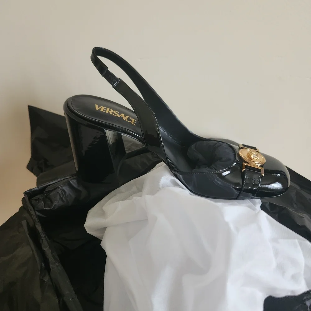 NIB Versace Glossy Black Heels with Gold Medallion